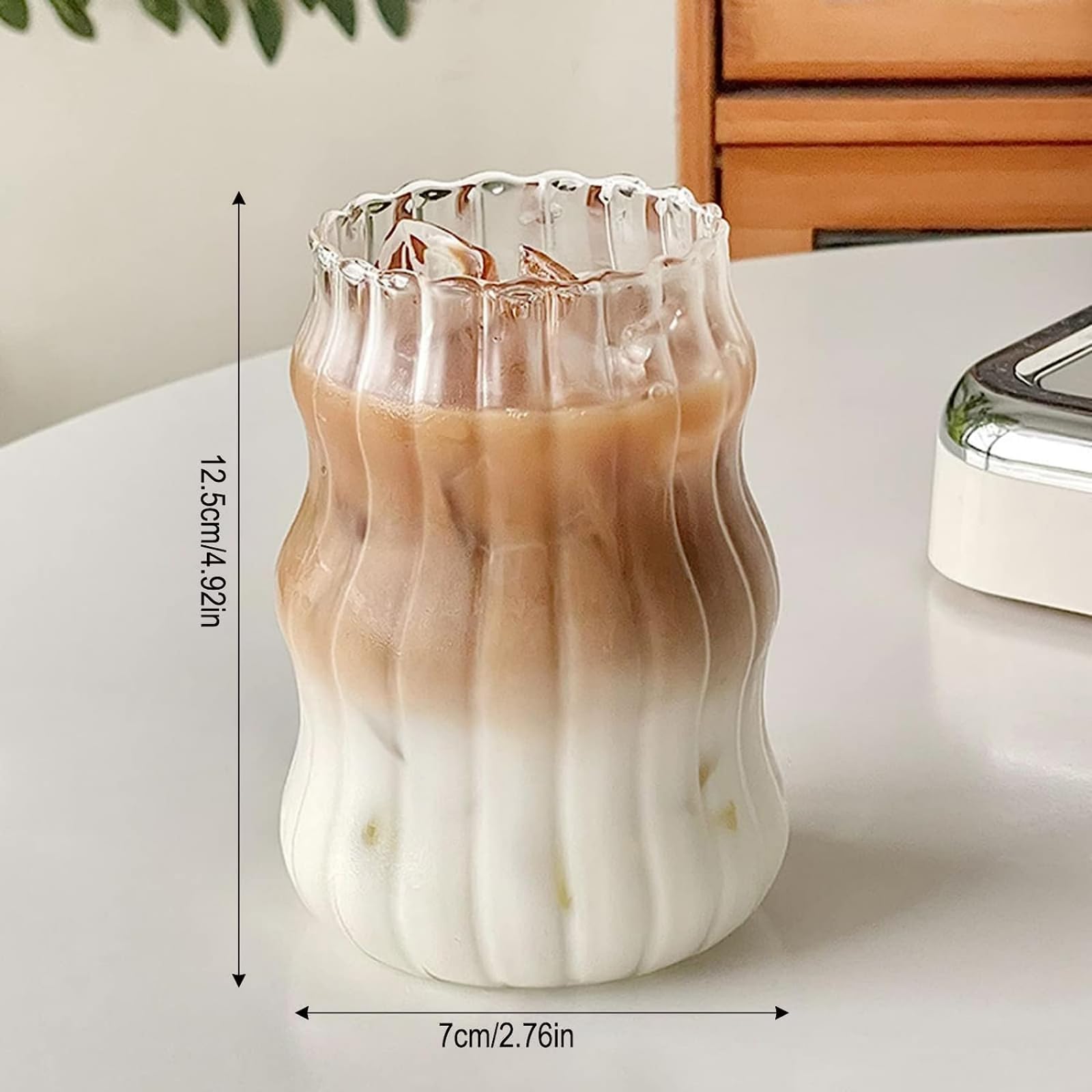 Nirvany ribbed glass cup with bubble texture, perfect for juices and cocktails