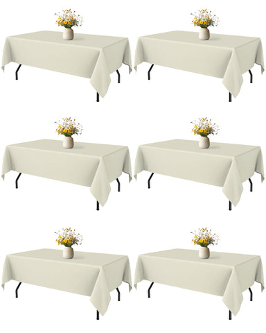 Niuara Ivory tablecloth on a 5ft rectangle table showing smooth drape