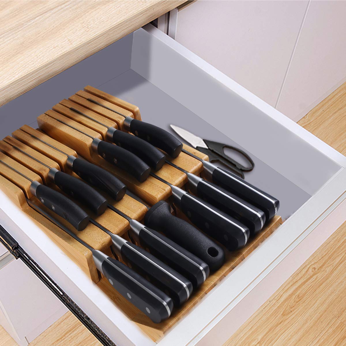 NIUXX knife sharpener slot keeps tools neatly stored.