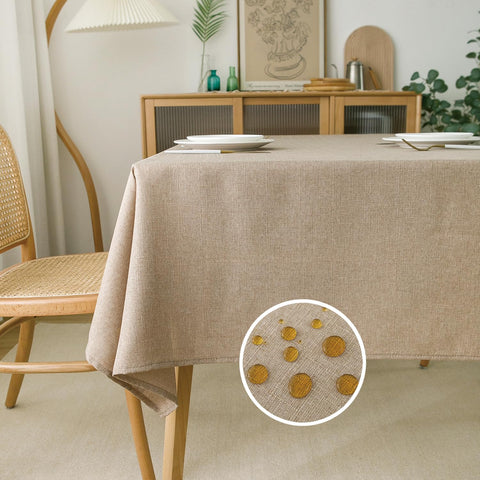 NLMUVW tan linen table cloth close-up texture for elegant dining.