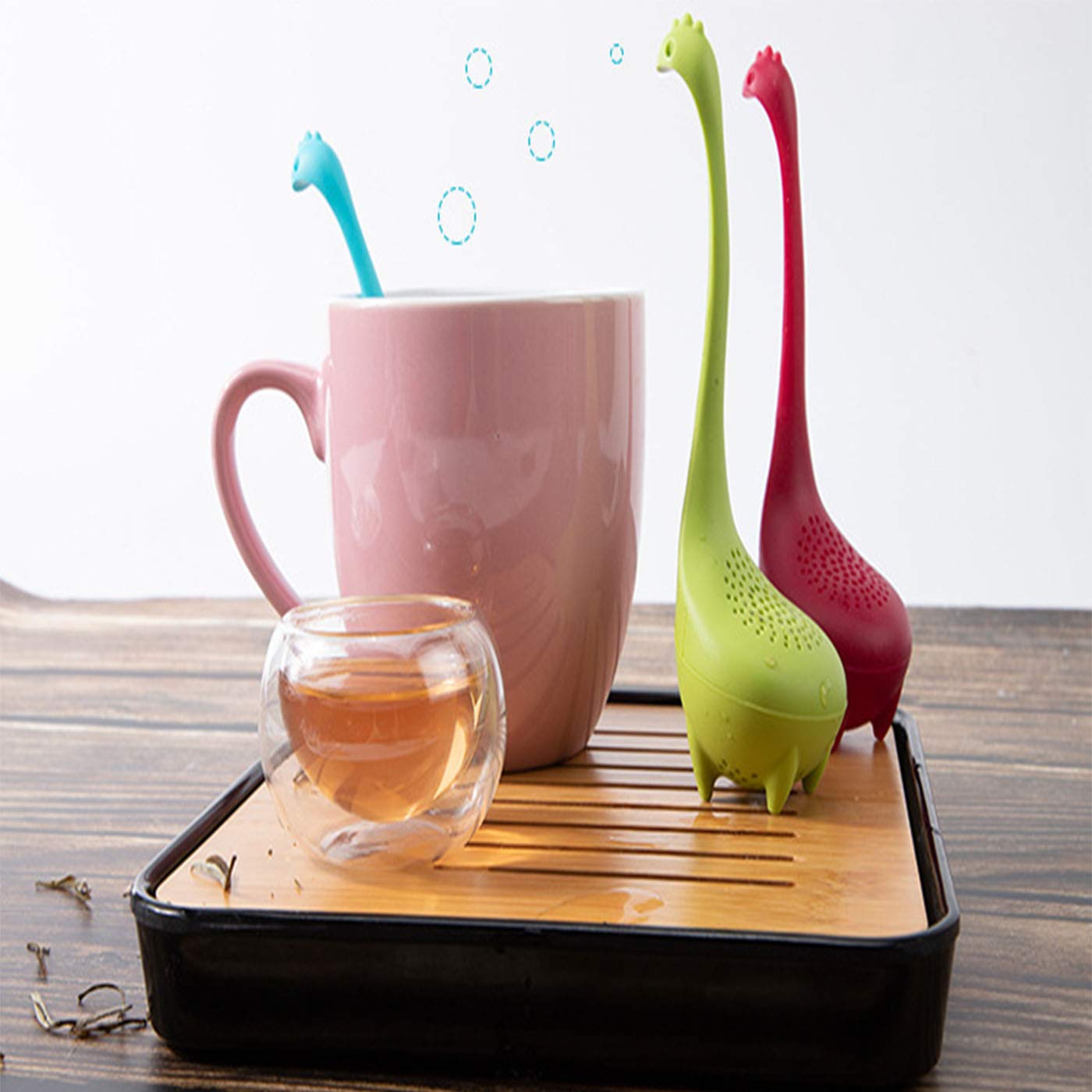 No Branded dinosaur tea infuser green in use with loose leaves