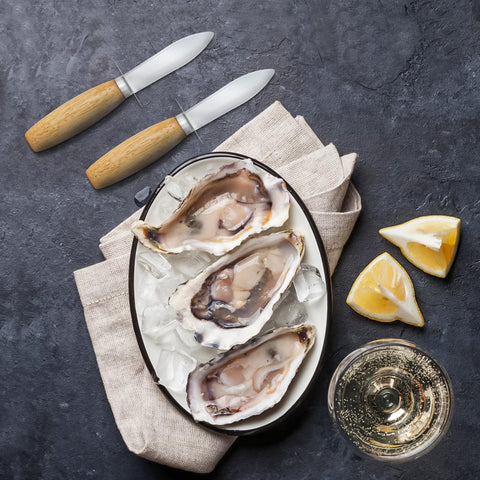 Nonley knife in action opening oysters at a seafood party