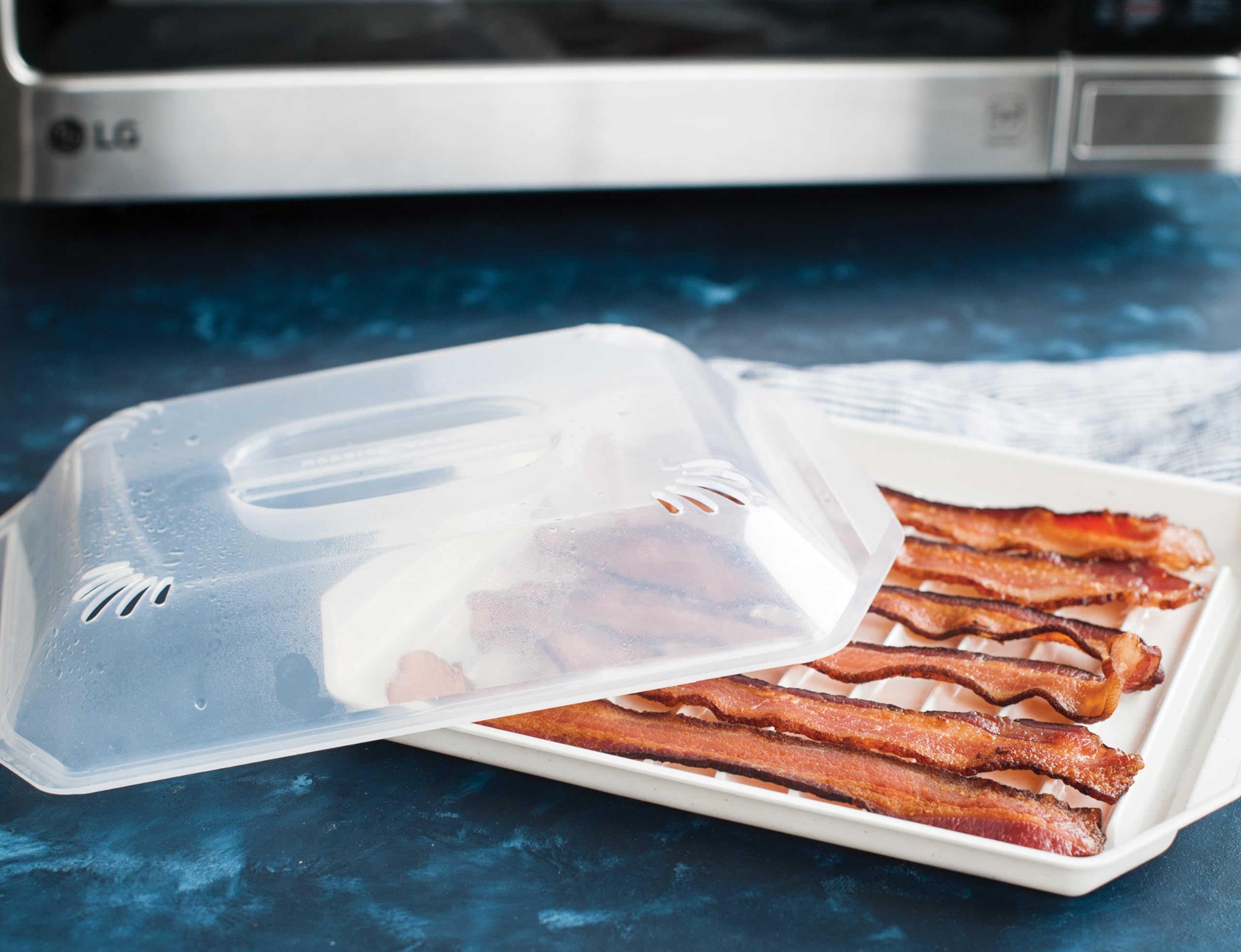 Nordic Ware bacon rack ribbed surface elevates bacon above grease for even cooking