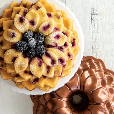 Nordic Ware Blossom Bundt Pan plated dessert looks ready for guests.
