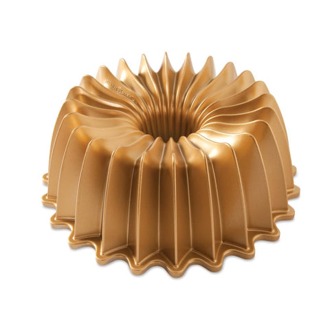 Nordic Ware Brilliance Bundt Gold with ornate flutes for elegant cakes.