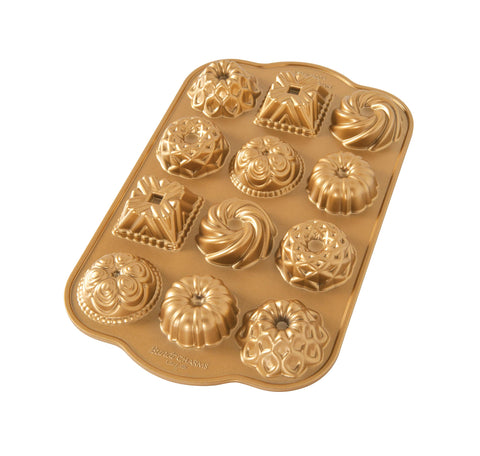 Nordic Ware Bundt Charms Square: durable cast aluminum for crisp mini cakes and easy release.