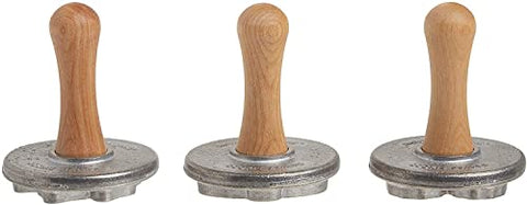 Nordic Ware cast aluminum stamps create 3D holiday designs on cookies