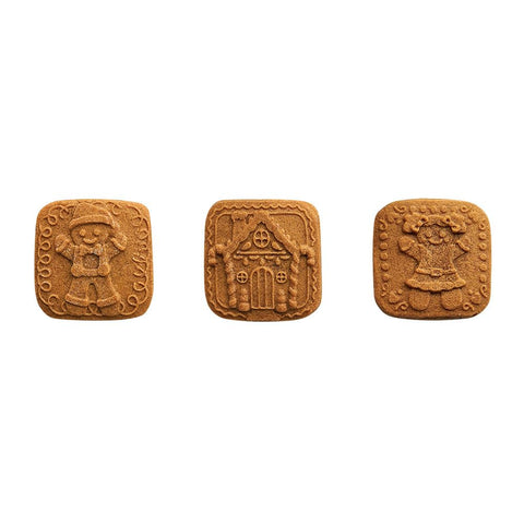 Nordic Ware cast aluminum stamps with wooden handles close-up