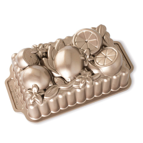 Nordic Ware Citrus Blossom Loaf Pan top view highlighting intricate bake detail