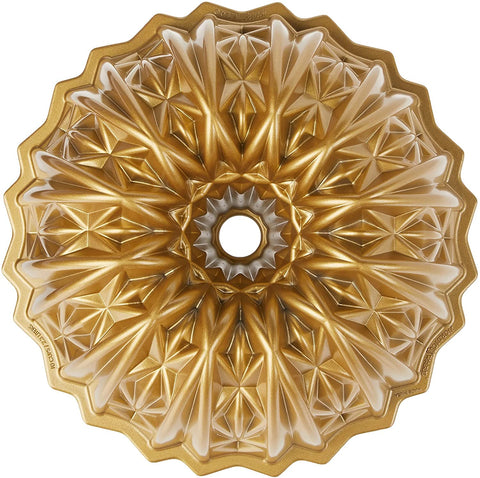 Nordic Ware Cut Crystal Bundt 10-Cup Gold front view highlighting intricate swirl for elegant desserts.