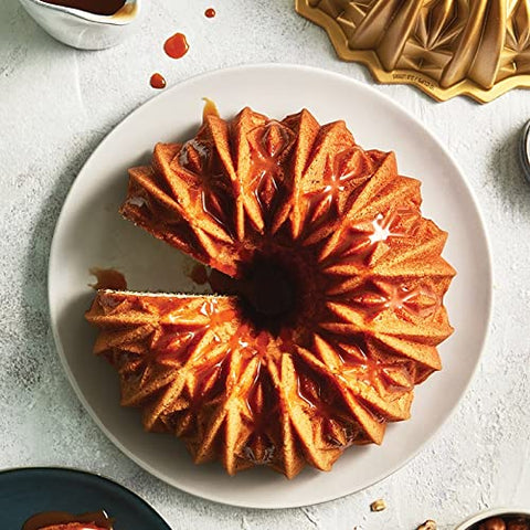 Nordic Ware Cut Crystal Bundt 10-Cup Gold nonstick surface for easy release.