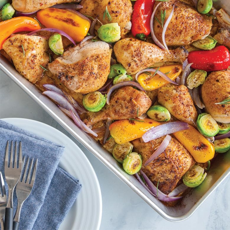 Nordic Ware natural aluminum pan with embossed rim highlights durability and warp resistance.