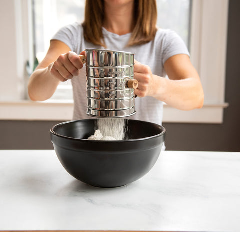 Nordic Ware flour sifter with beechwood knobs offering a sturdy grip