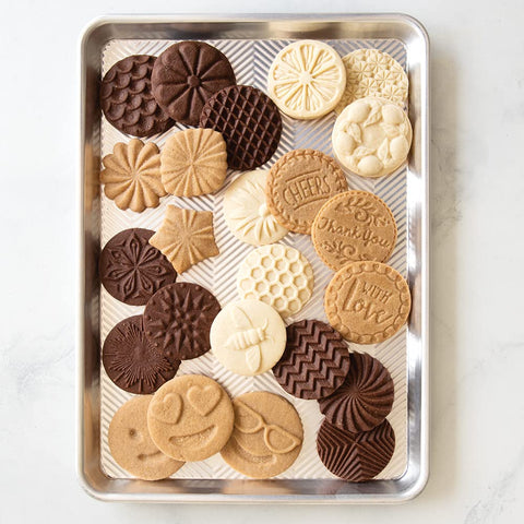Nordic Ware Honeybee stamps imprinting dough with clear pattern