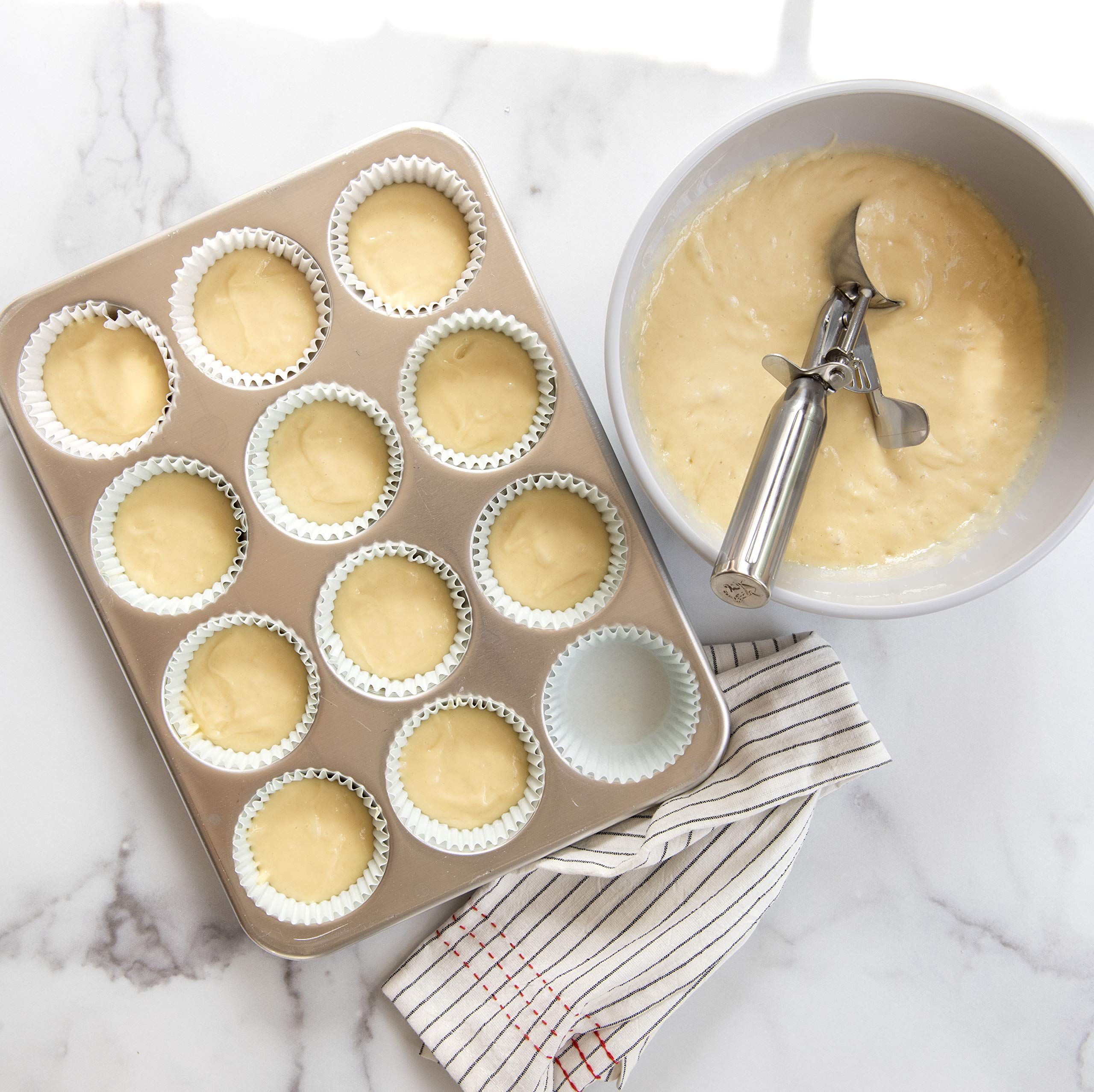Nordic Ware stainless steel scoop in action for even monster cookies.