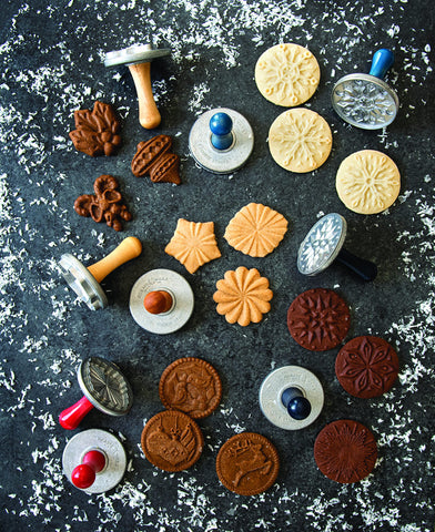 Set of 3 cast aluminum stamps designed for holiday baking