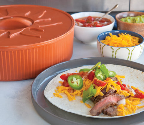 Nordic Ware microwave warmer shown with pancakes for versatile reheating options.