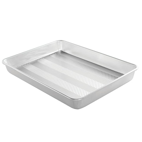 Nordic Ware Prism top-view shows grid for even air flow and easy release.