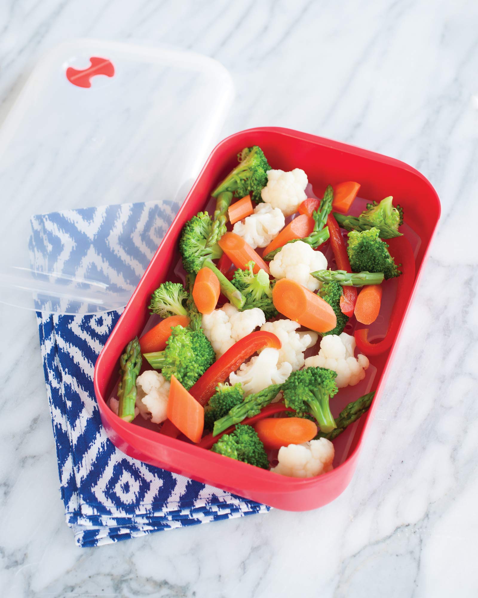 Nordic Ware Steam Cooker base-dimensions reflect a compact kitchen-friendly footprint.