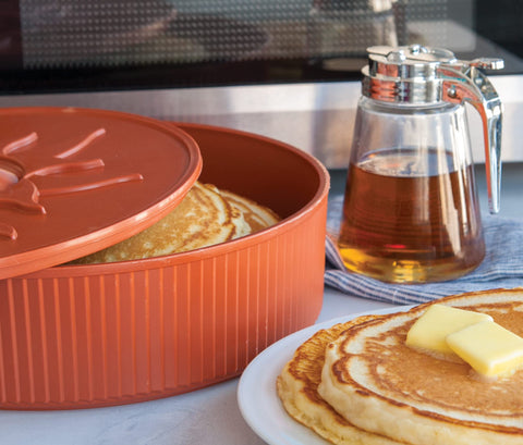 Shelf-ready Nordic Ware packaging highlights sturdy construction and microwave-friendly use.