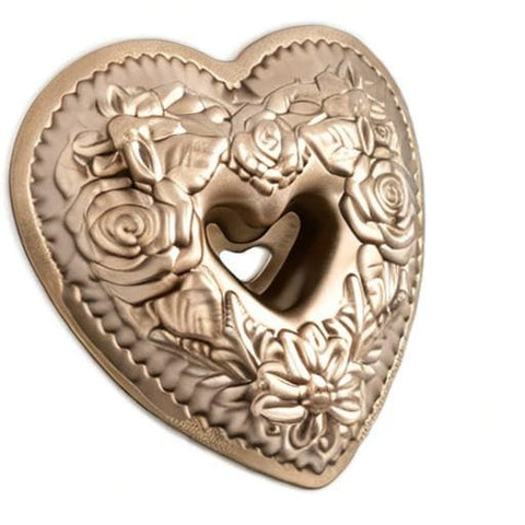 Nordic Ware Wildflower Heart Bundt pan dimensions show 9.4 by 9.3 inches.