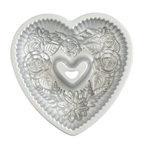 Nordic Ware Wildflower Heart Bundt pan oven safe to 400°F for versatile baking.