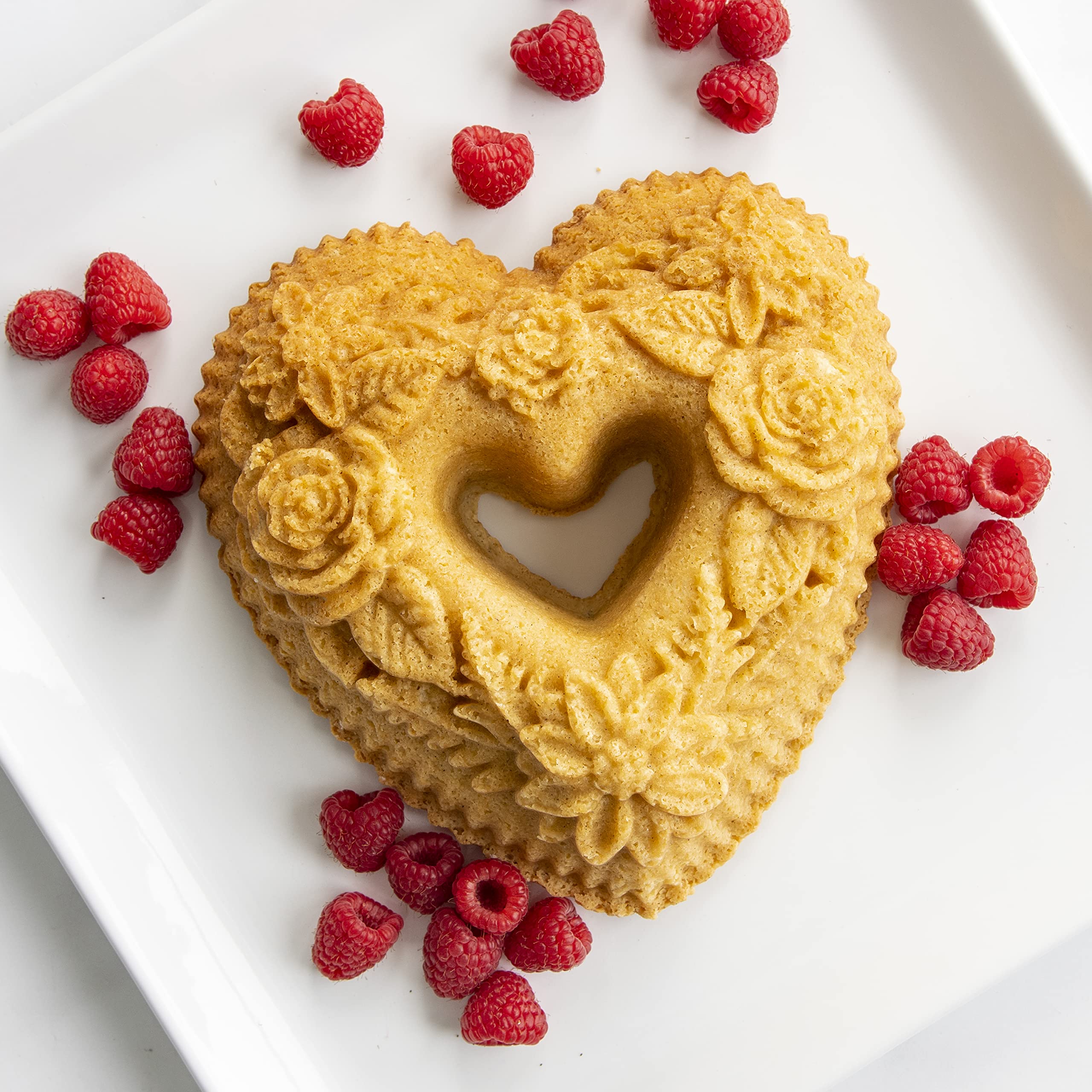 Nordic Ware Wildflower Heart Bundt pan side profile shows sturdy cast aluminum.