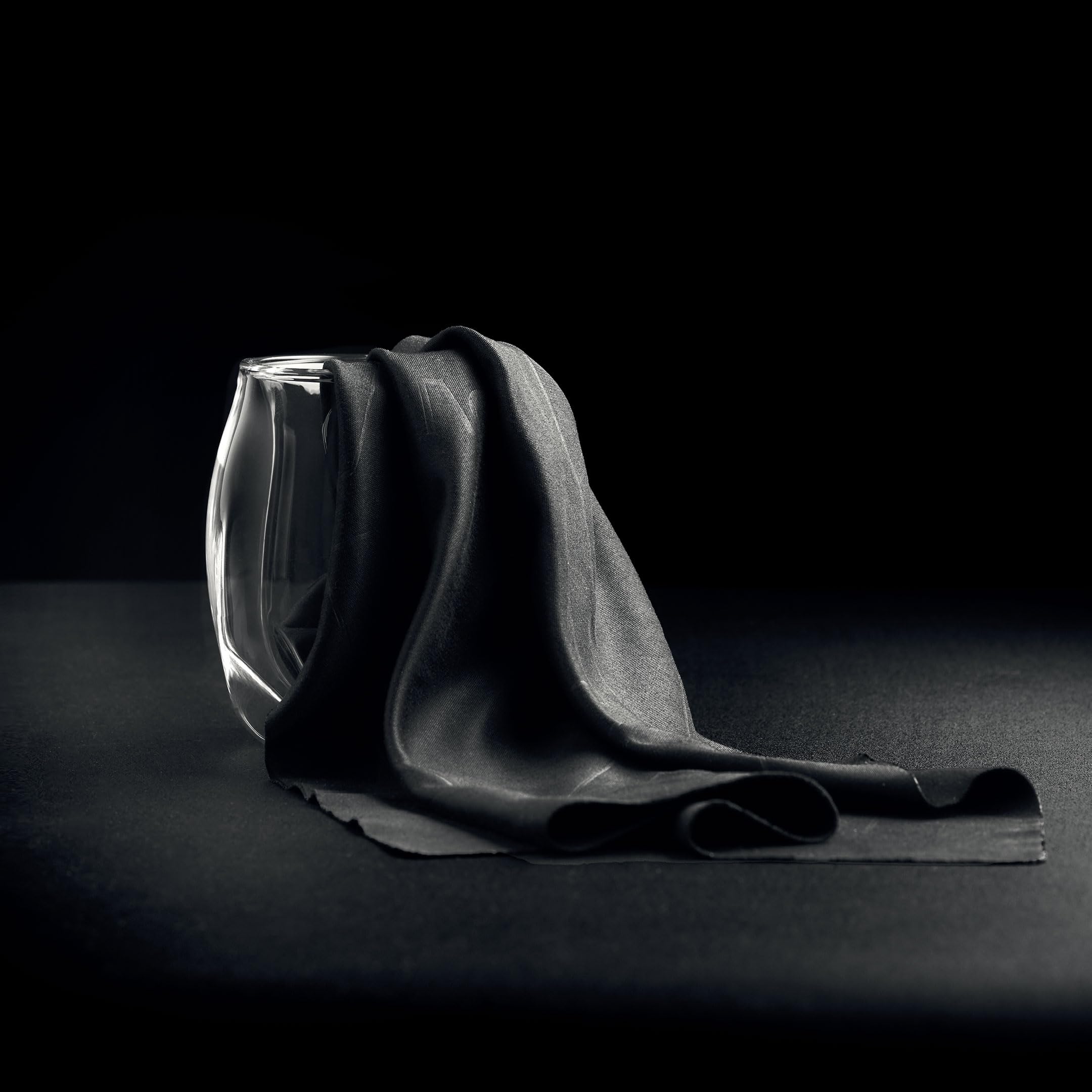 NORLAN Whisky Glass unboxing showing premium packaging and care accessory