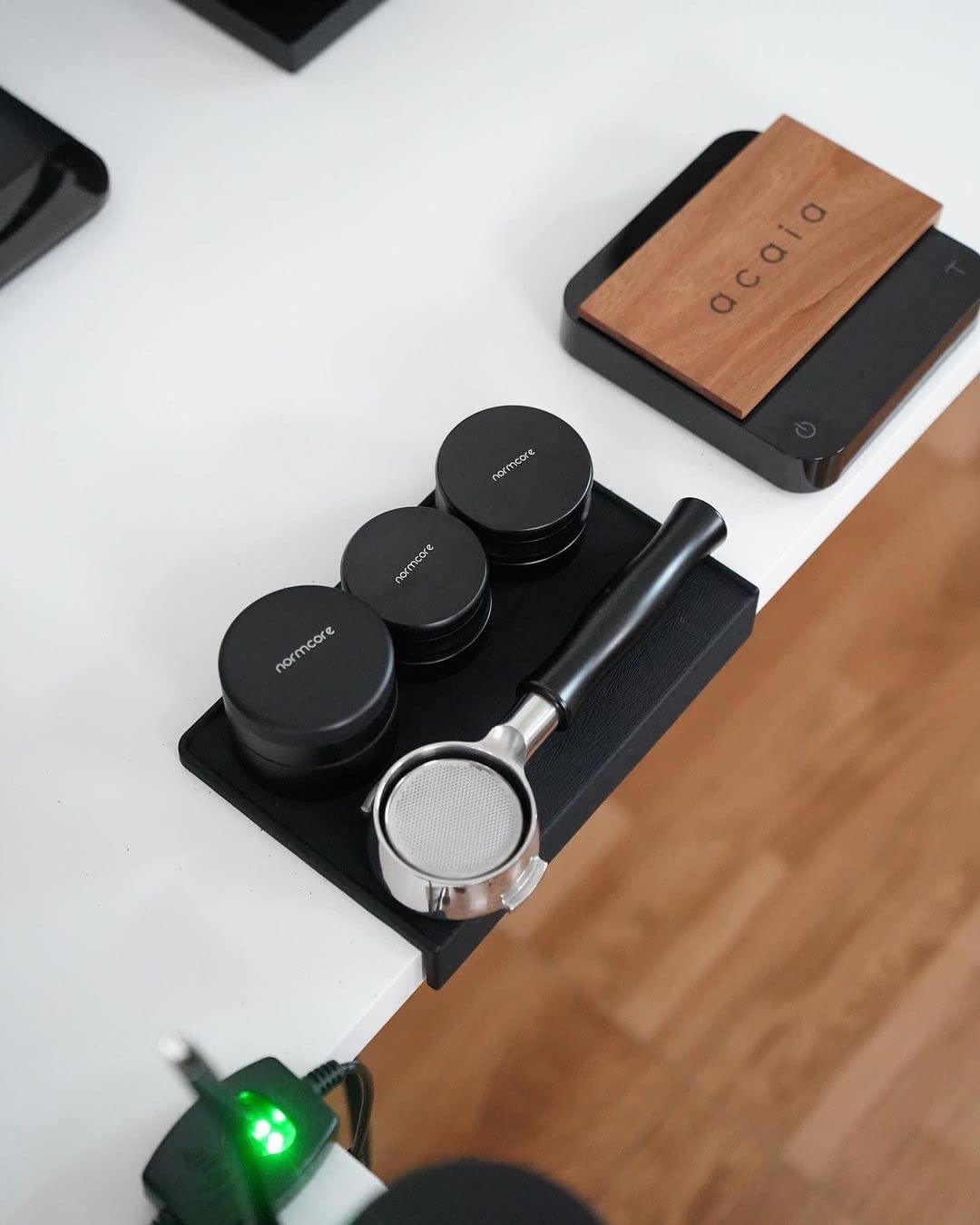 Normcore Espresso Tamping Station fits tight bars and home setups without crowding