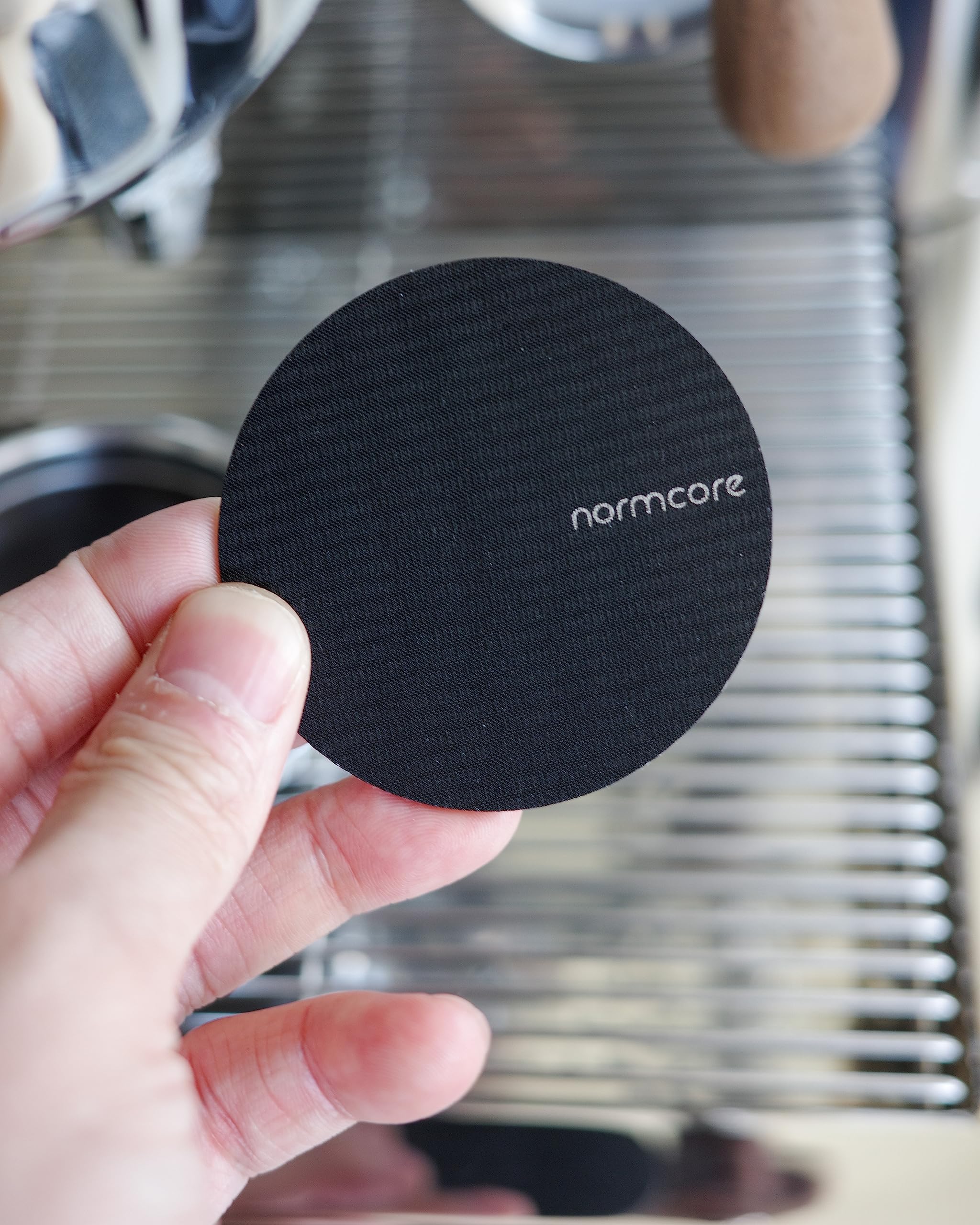 Normcore lower shower screen in 316 stainless steel for durable espresso prep.