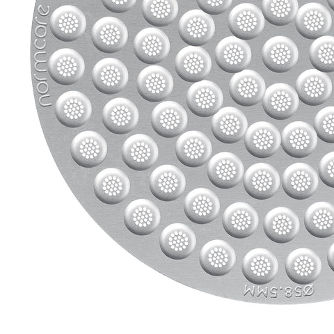 Normcore puck screen made of 316 stainless steel for durability and easy cleaning.