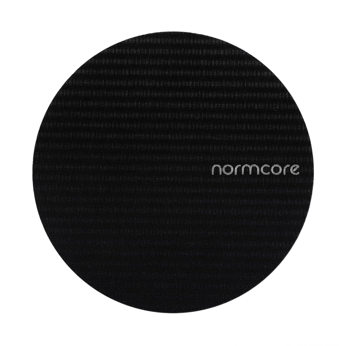 Normcore puck screen with titanium PVD coating, ready for durable espresso use and easy cleaning