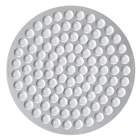 Normcore puck screen closeup emphasizes the 58.5mm edge for balanced extraction.