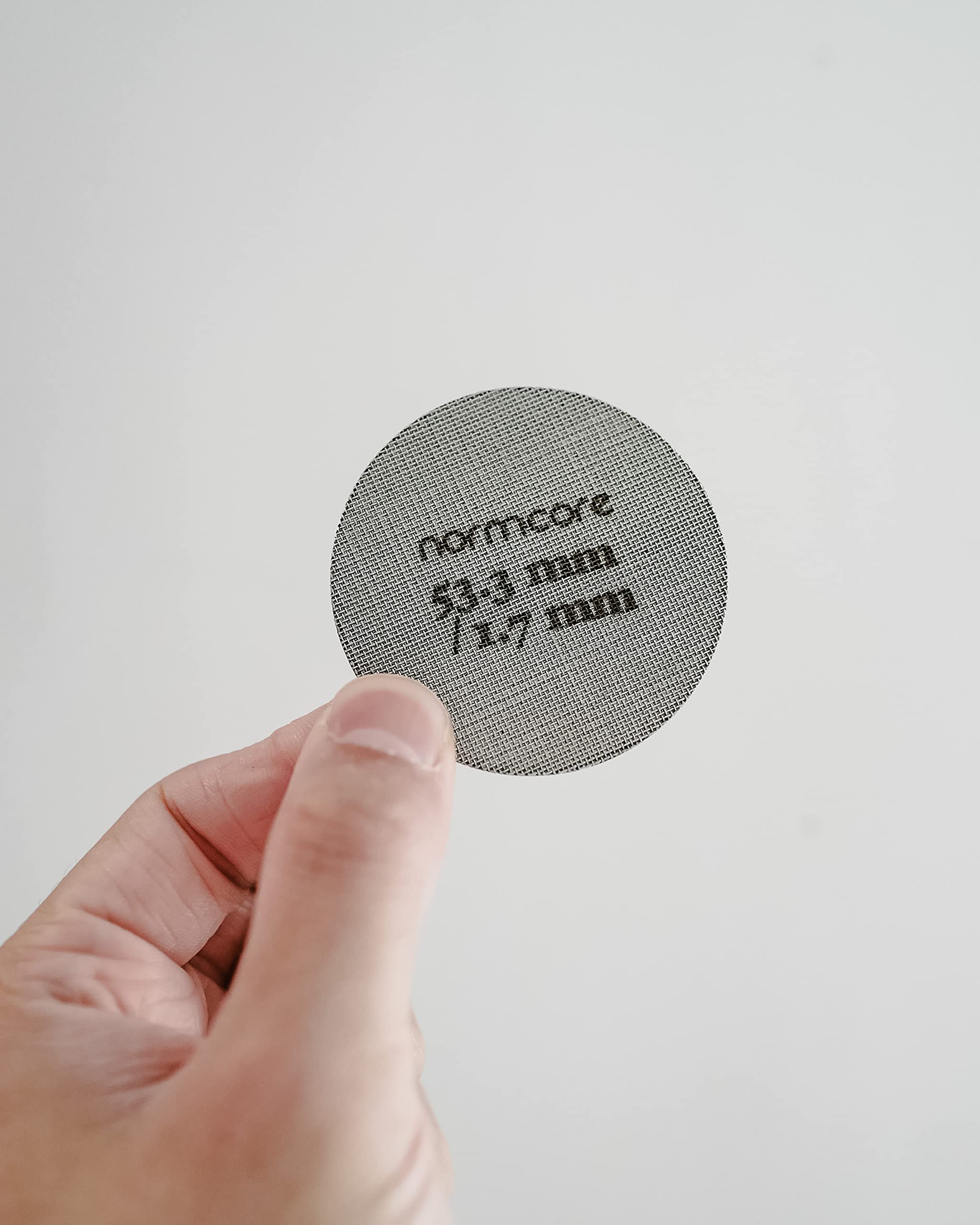 Normcore puck screen demonstrates smoother flow within the brew head