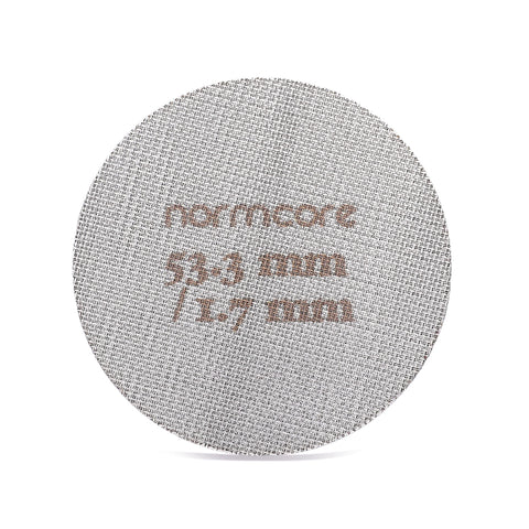 Normcore puck screen fitted to a 54mm portafilter for secure, even extraction