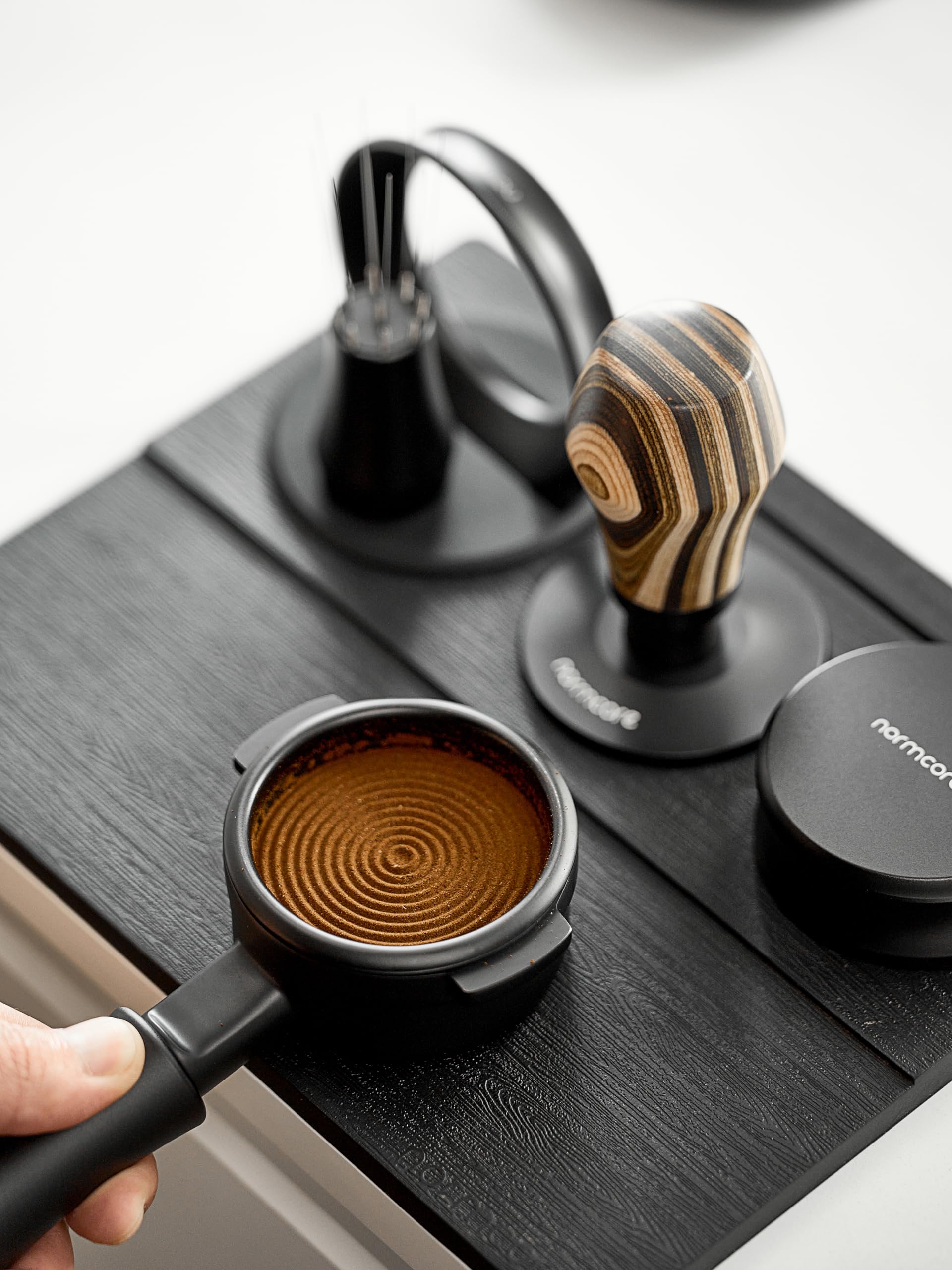 Normcore Tamping Mat anti-slip surface keeps portafilter steady during tamping
