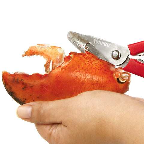 Norpro 6516 red shears cutting through crab legs and lobster tails.