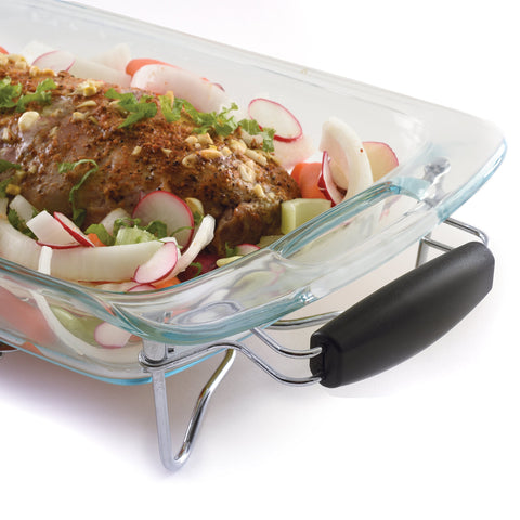 Norpro expanding trivet on the table enables easy transfer of hot or cold dishes.