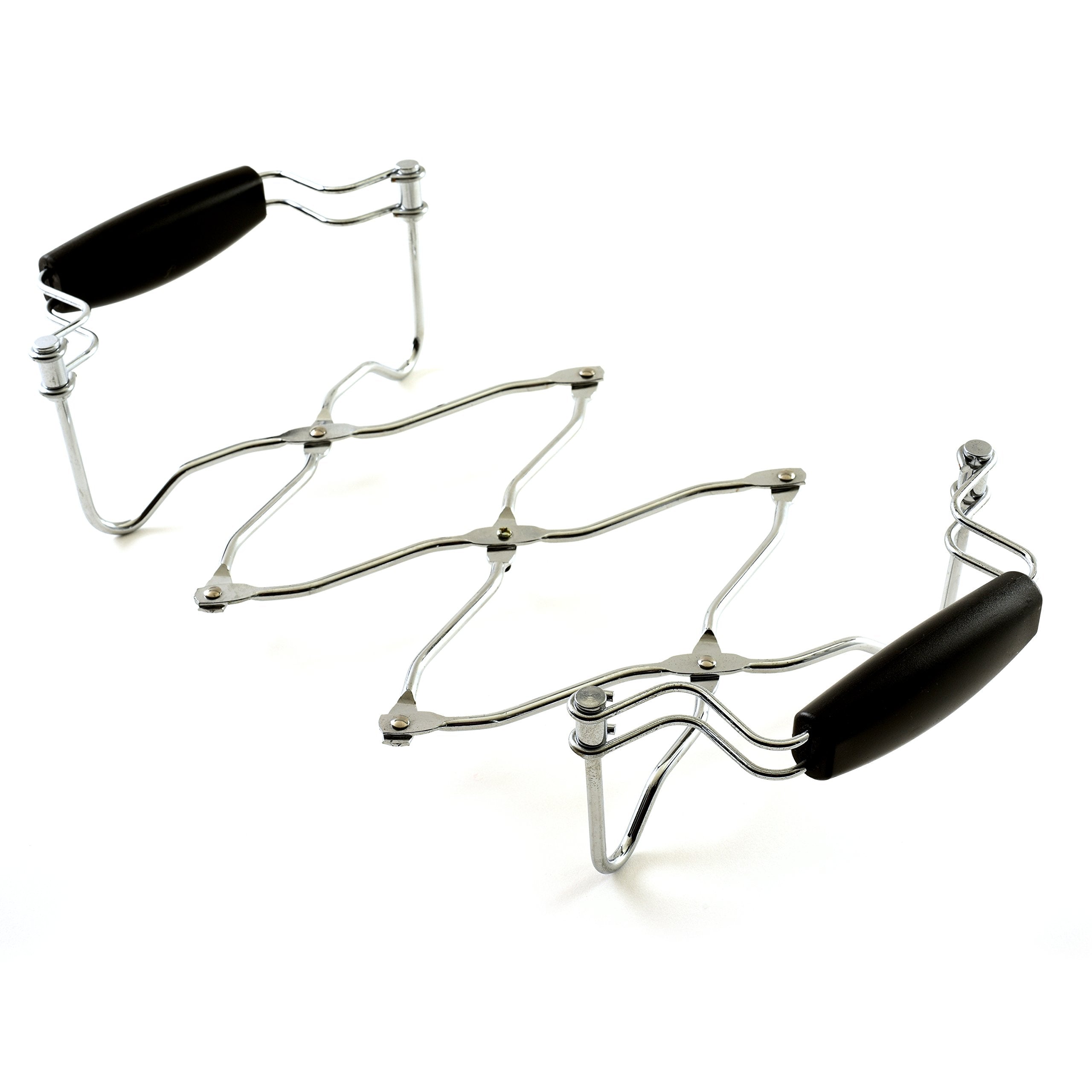 Norpro expanding trivet expanded to fit a large dish at the table, protecting surfaces.