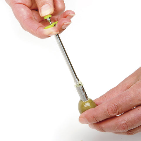 Norpro olive stuffer with green handle enabling precise hors d'oeuvres fillings.