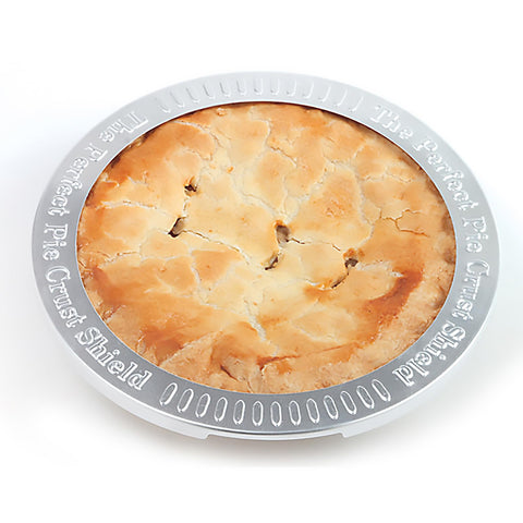 Norpro pie crust shield placed on pie to prevent spillovers during bake