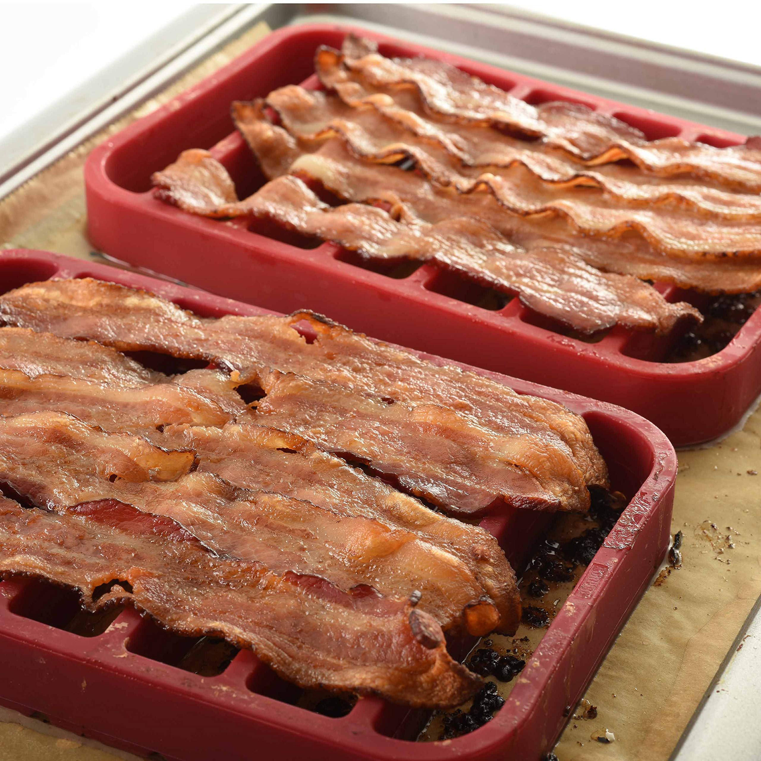 Norpro rectangle silicone roasting rack red, in-use shows elevated food for even browning