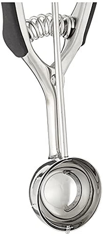 Norpro scoop with Santoprene handle portions rice and vegetables precisely.