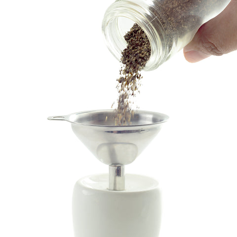 Norpro funnels nested with clip-ring for compact storage.