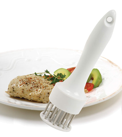 Norpro TenderizerPro-BX prepping poultry to absorb marinade more deeply.