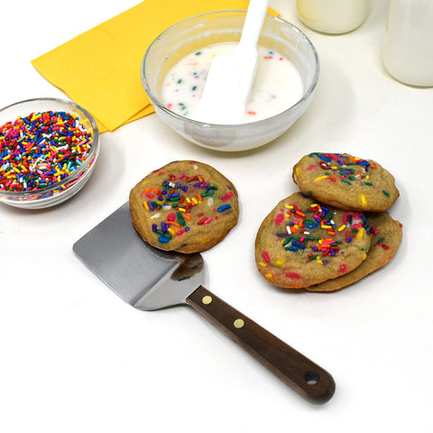 Norpro wood-handled spatula detail highlighting comfortable grip during prep