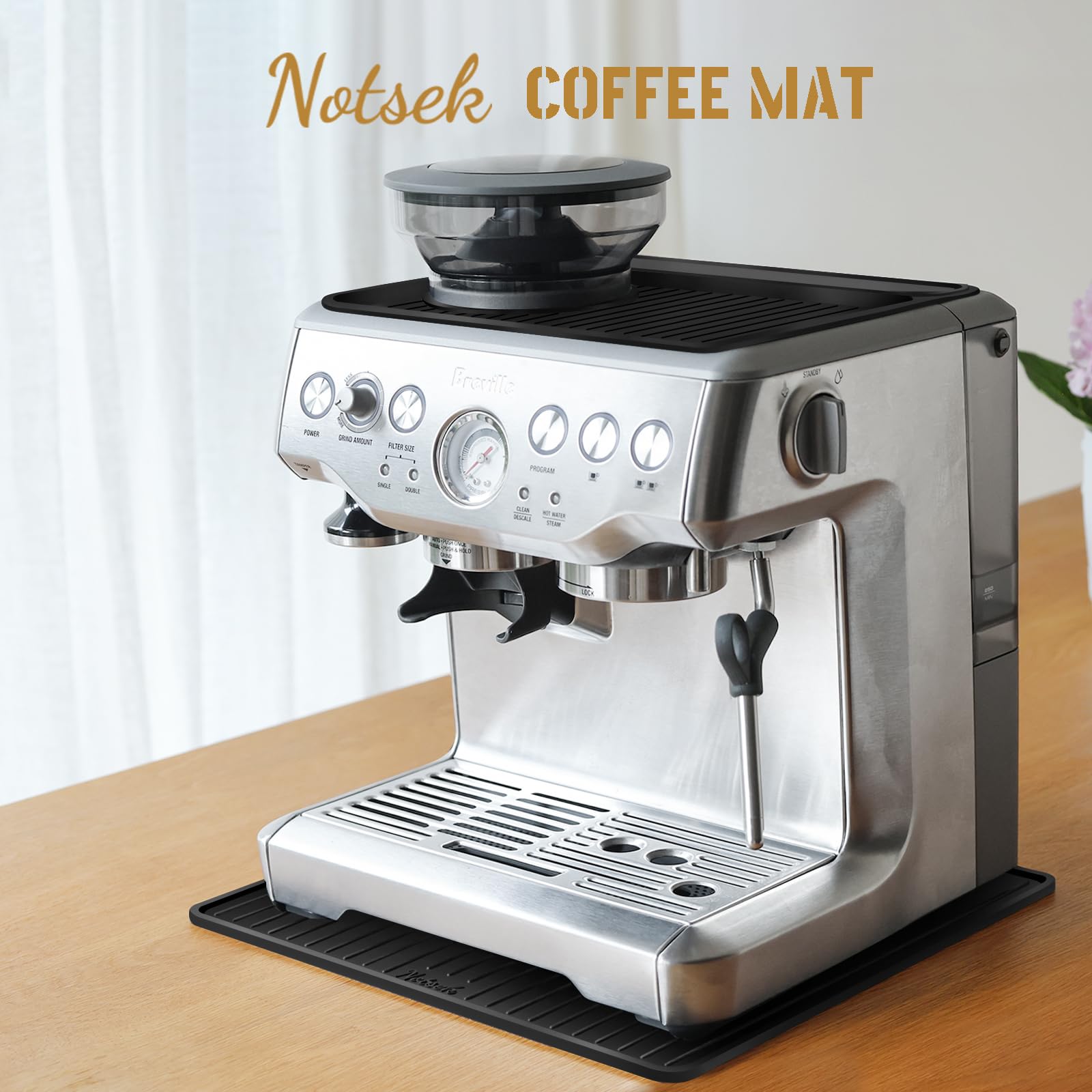 NOTSEK coffee bar mat with raised lip contains drips.