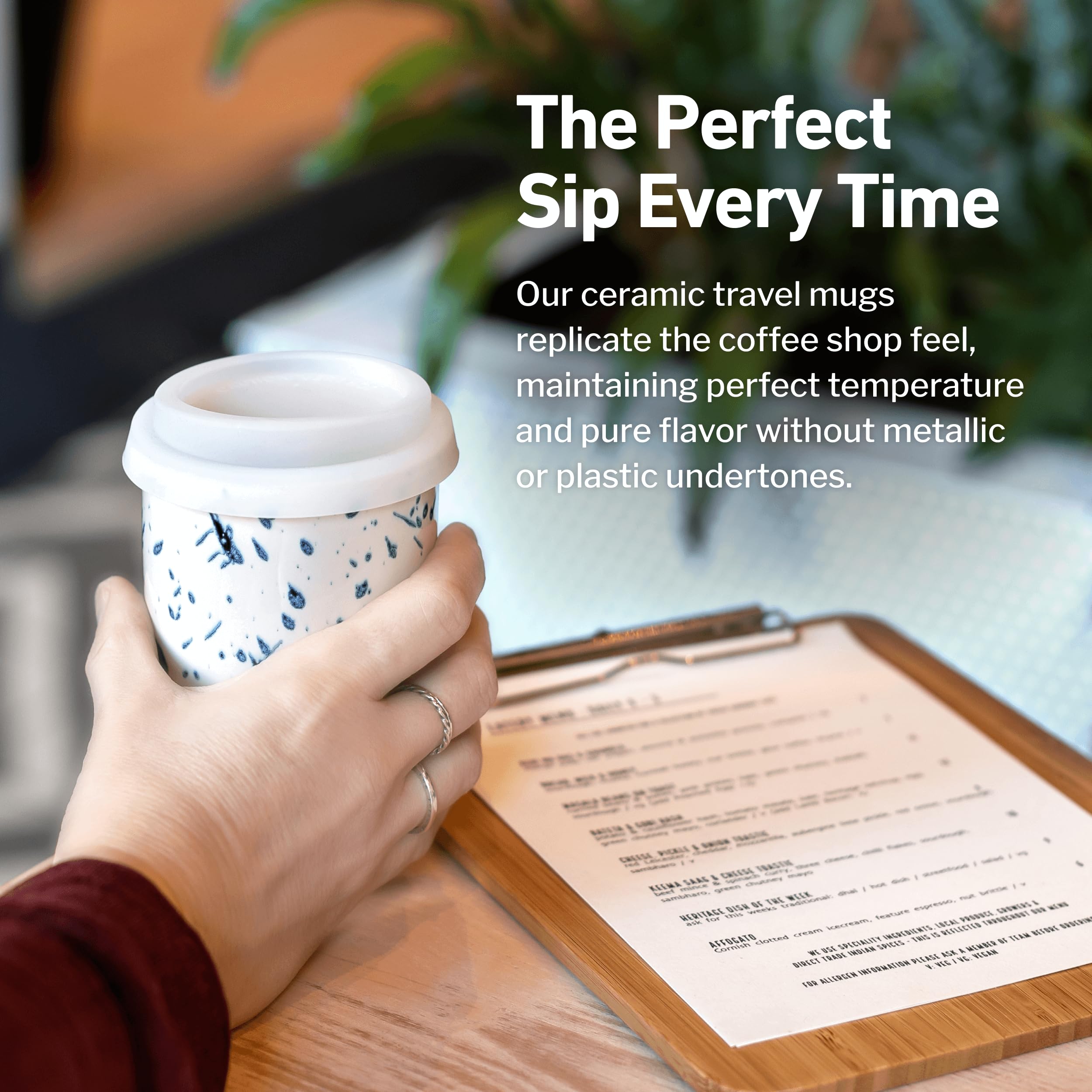 NOVA CERAMICS Orchid travel mug microwave-safe icon signals easy reheating.