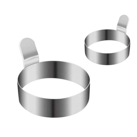 NovaFuse 4-pack egg moulds on a pan showing uniform breakfast shapes