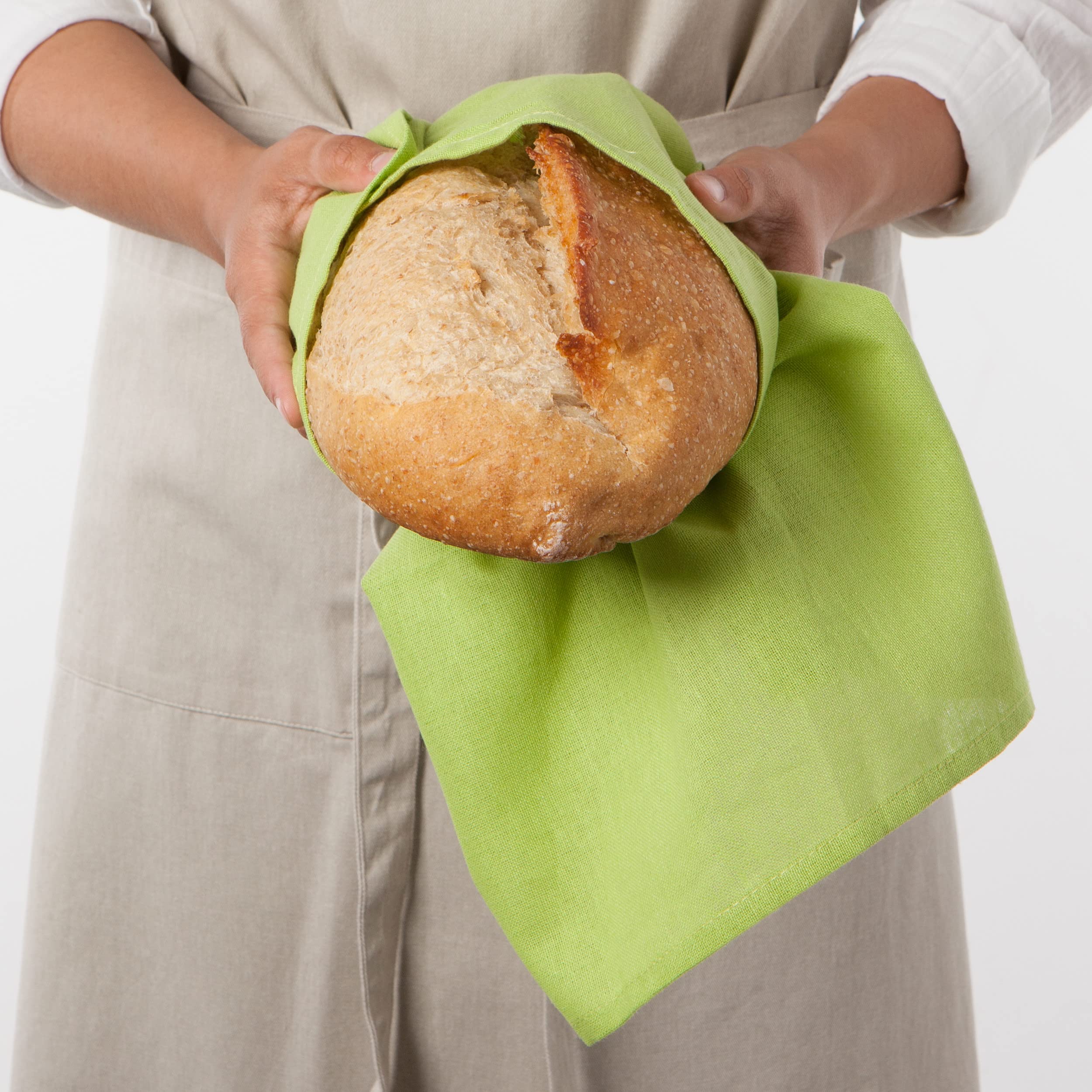 Now Designs flour sack towels draped over a bowl for dough proofing